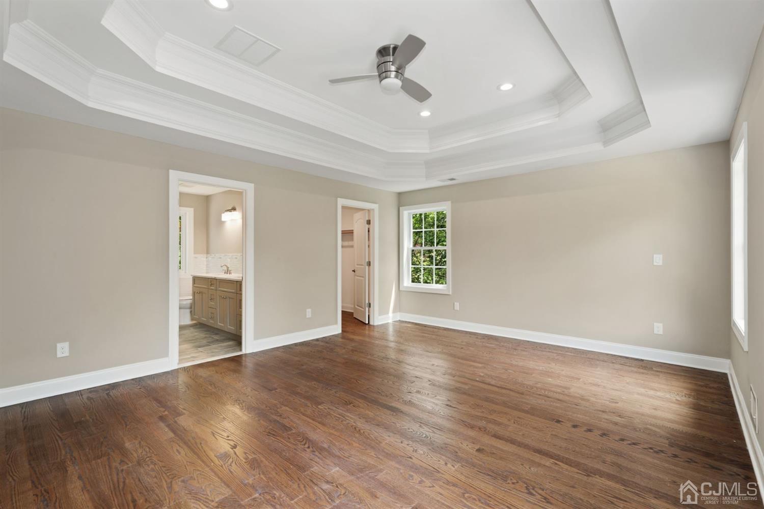13 Perry Road East Brunswick, NJ 08816 - Photo 17 of 25 wooden floor in an empty room with a window