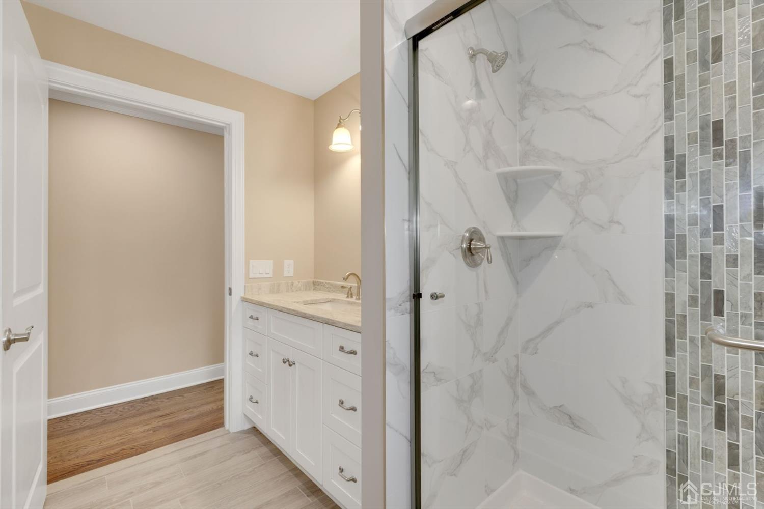 13 Perry Road East Brunswick, NJ 08816 - Photo 10 of 25 a bathroom with a shower