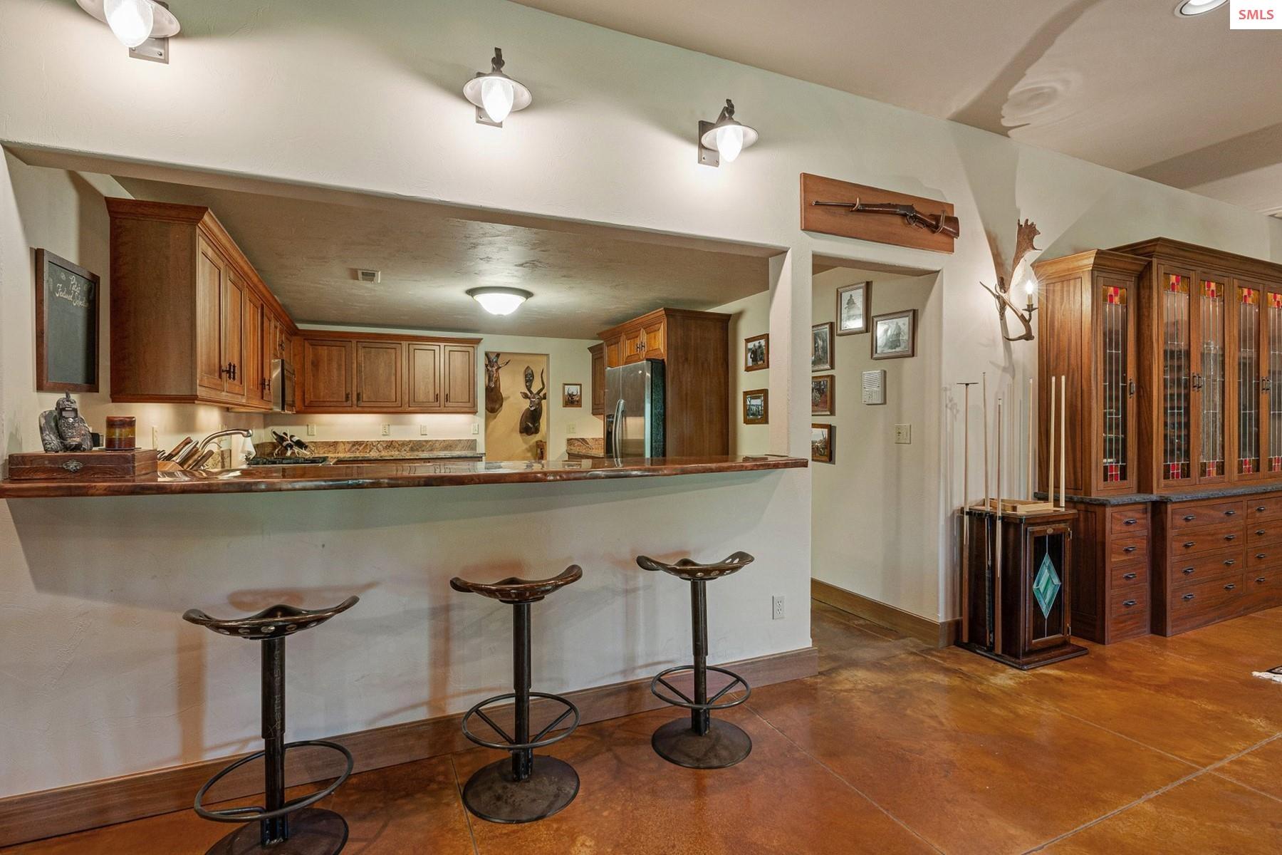 526 Roop Road Cocolalla, ID 83813 - Photo 44 of 100 Downstairs custom kitchen