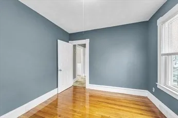 a view of an empty room and window