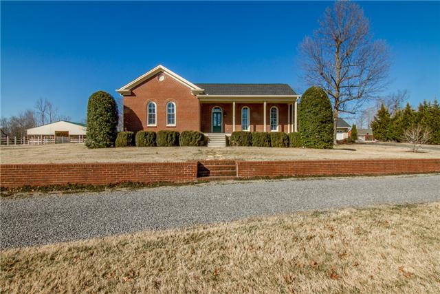4881 Campbell Road Cross Plains, TN 37049 - Photo 1 of 19 a front view of a house with garden