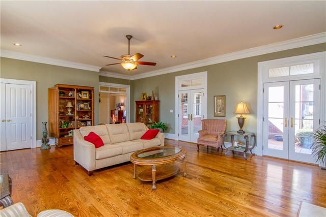 4881 Campbell Road Cross Plains, TN 37049 - Photo 19 of 19 a living room with furniture and wooden floor