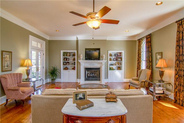 4881 Campbell Road Cross Plains, TN 37049 - Photo 3 of 19 a living room with fireplace furniture and a large window