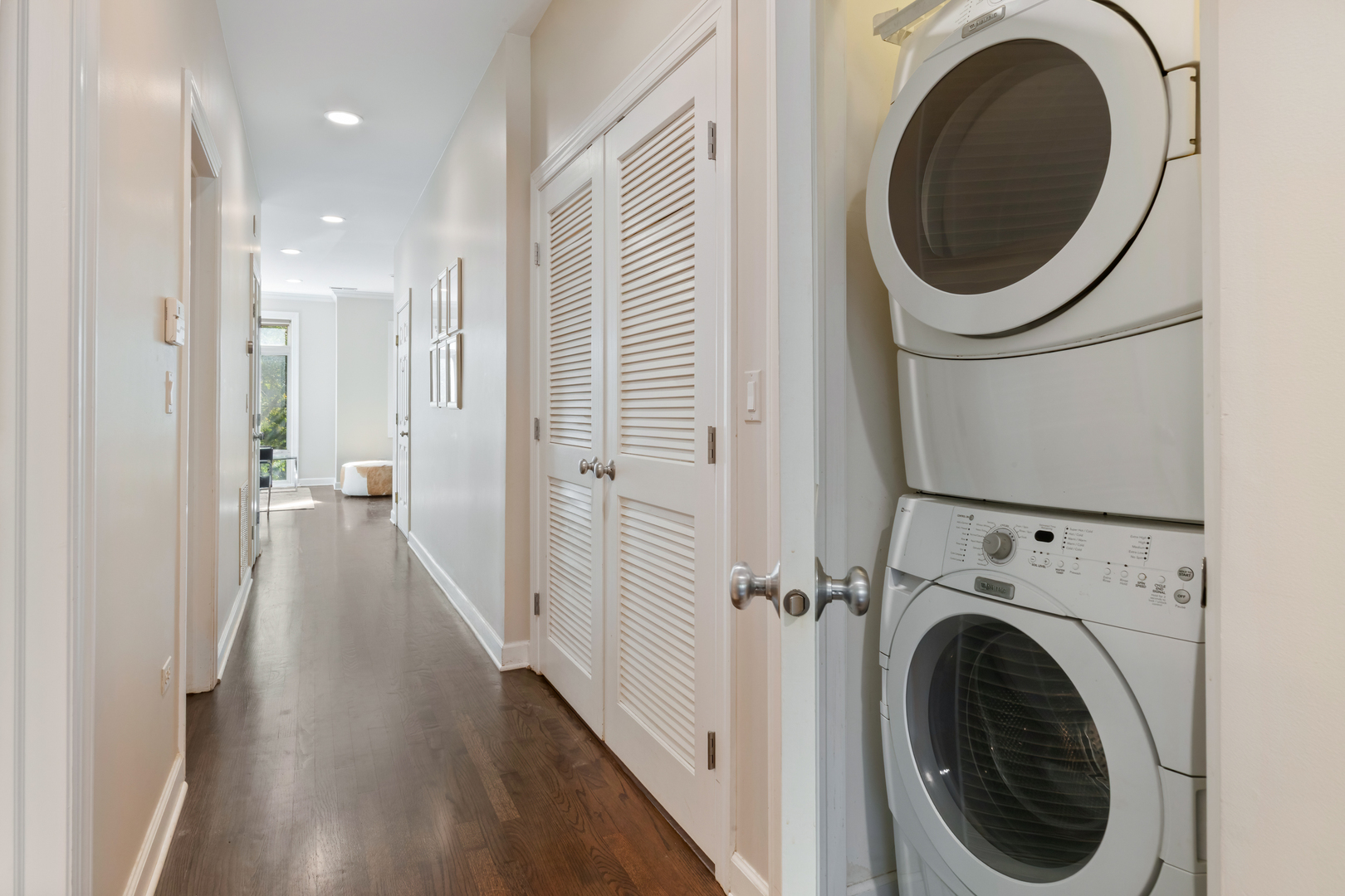 3438 North Ashland Avenue, Unit 2N Chicago, IL 60657 - Photo 13 of 22 a view of a hallway with washer and dryer