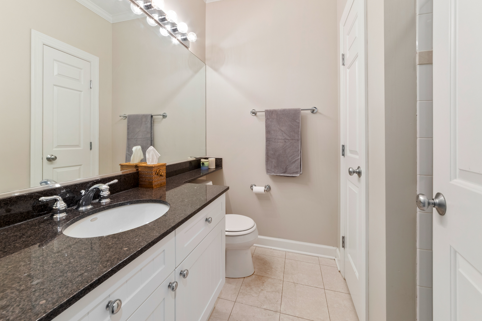 3438 North Ashland Avenue, Unit 2N Chicago, IL 60657 - Photo 14 of 22 a bathroom with a granite countertop sink toilet and shower