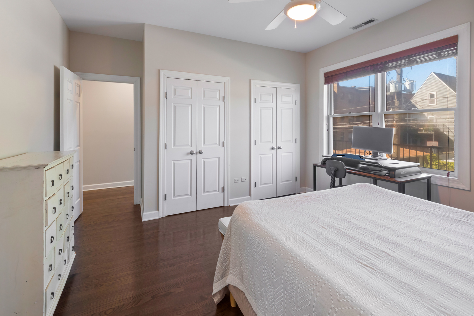 3438 North Ashland Avenue, Unit 2N Chicago, IL 60657 - Photo 18 of 22 a bedroom with a bed and a window