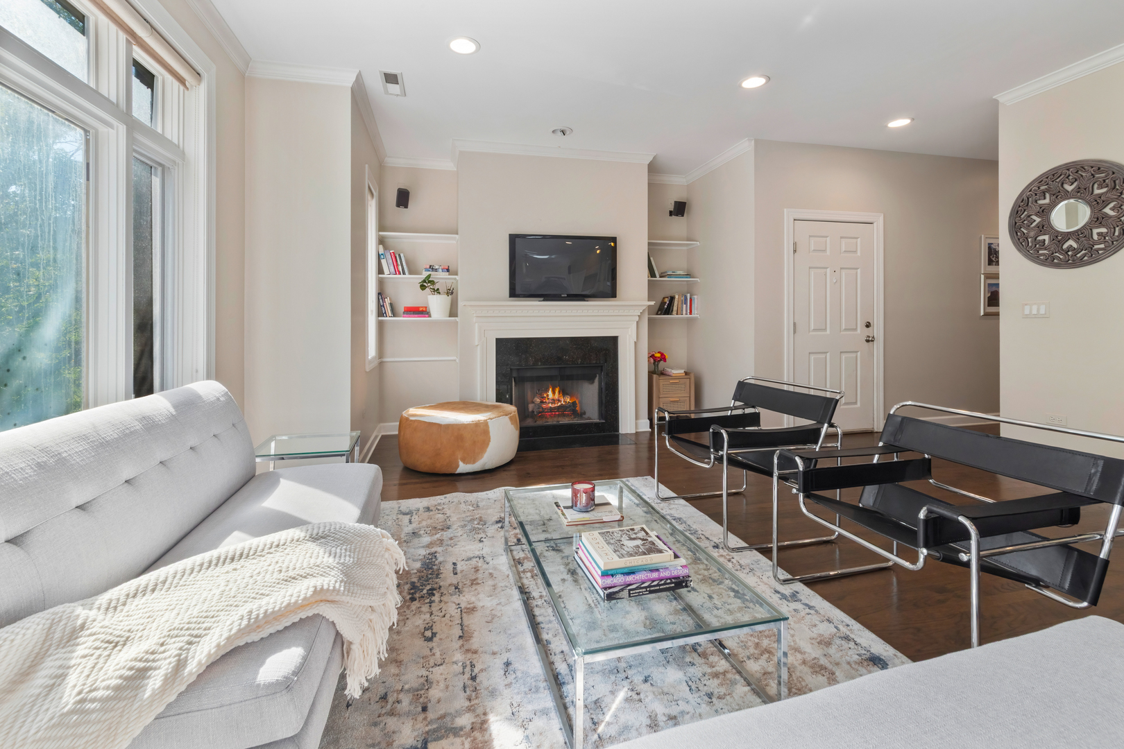3438 North Ashland Avenue, Unit 2N Chicago, IL 60657 - Photo 4 of 22 a living room with furniture and a fireplace
