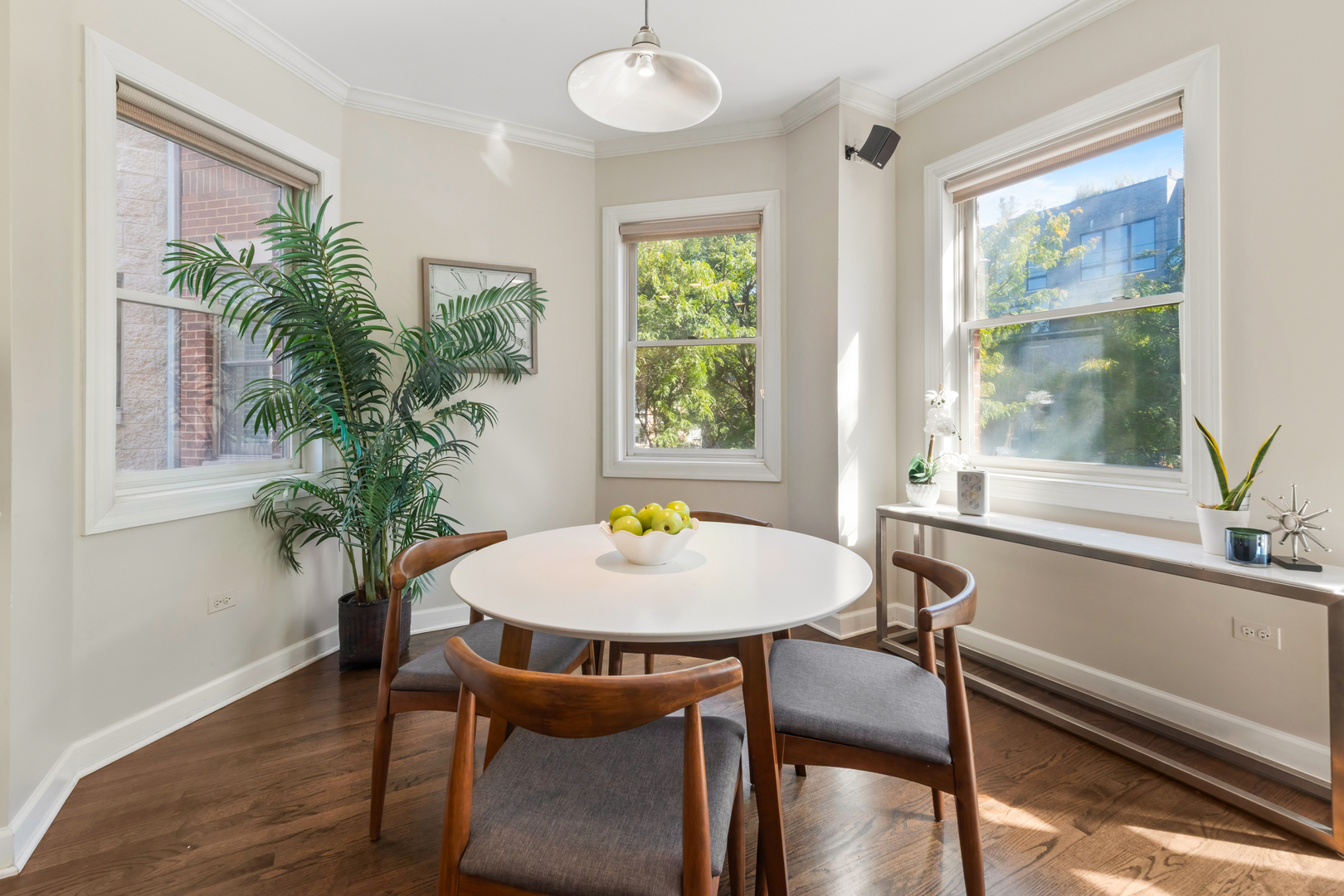 3438 North Ashland Avenue, Unit 2N Chicago, IL 60657 - Photo 6 of 22 a view of a dining room with furniture window and wooden floor