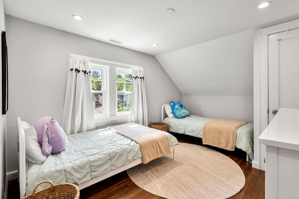 14 Pierrepont Road Newton, MA 02462 - Photo 25 of 33 a bedroom with two beds and a large window