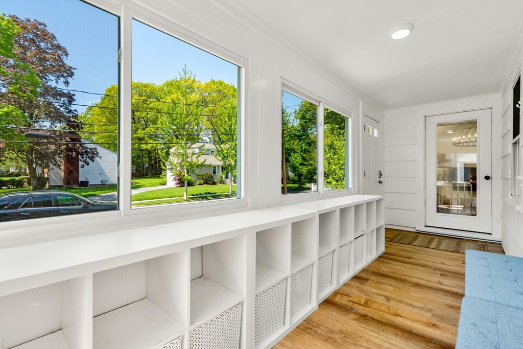 14 Pierrepont Road Newton, MA 02462 - Photo 3 of 33 a view of a two room with wooden floor and windows