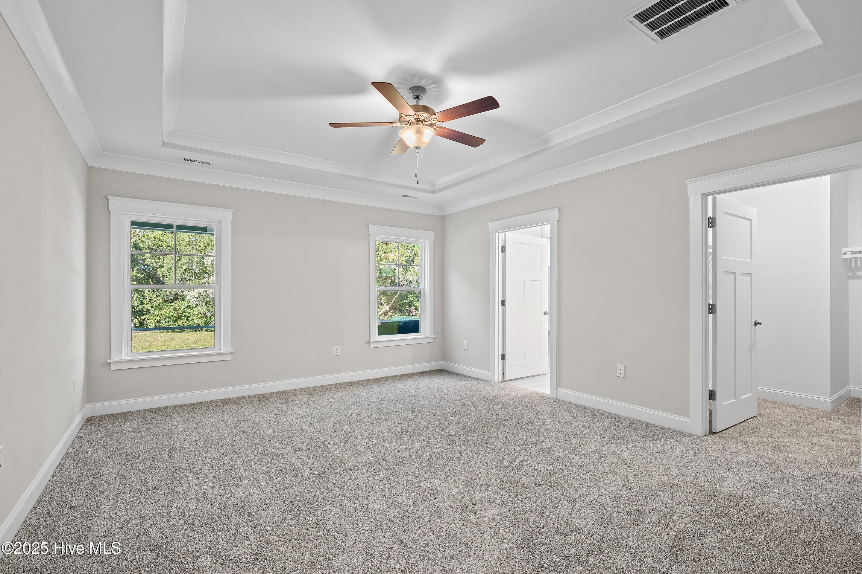 107 Spicer Lake Drive Holly Ridge, NC 28445 - Photo 12 of 37 First-floor primary suite