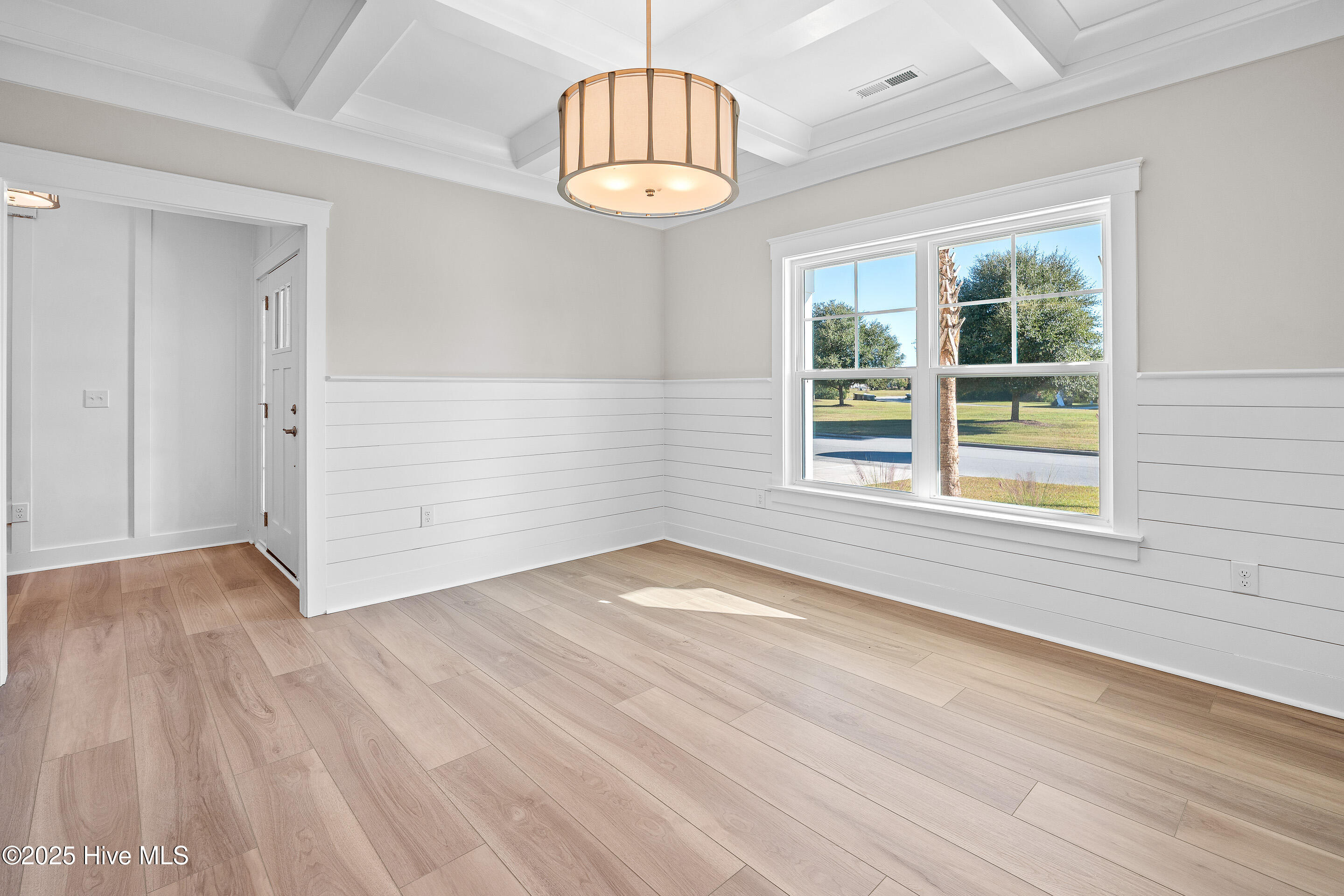 107 Spicer Lake Drive Holly Ridge, NC 28445 - Photo 14 of 56 dining room w/shiplap & coffered ceiling