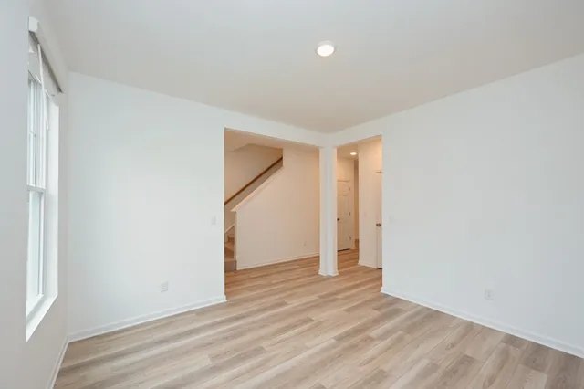 a view of entryway with wooden floor