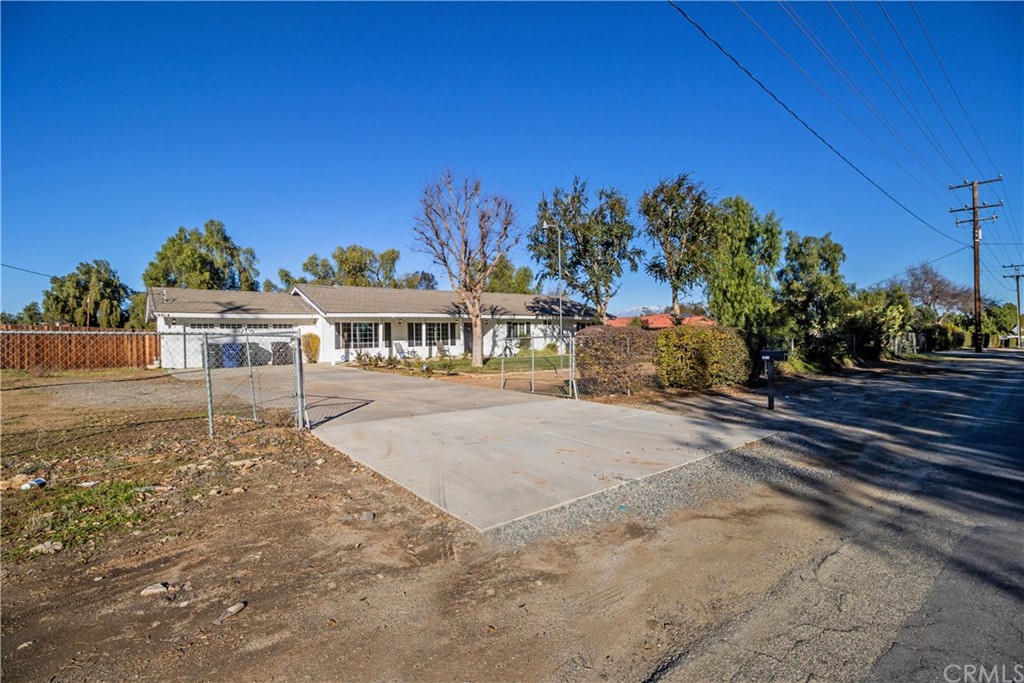 19014 Mariposa Avenue Riverside, CA 92508 - Photo 1 of 1 a front view of a house with a yard