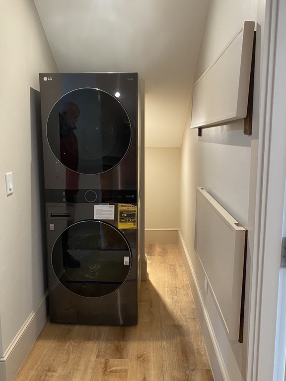 374 Main Street, Unit 2 Gloucester, MA 01930 - Photo 7 of 12 a close view of water heater and dryer