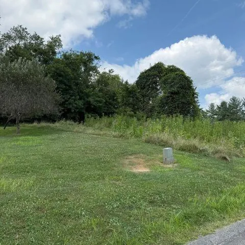 a view of a lake view with a big yard