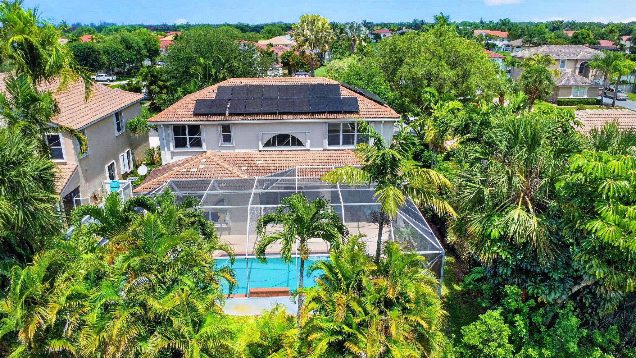 6283 Shadow Tree Lane Lake Worth, FL 33463 - Photo 2 of 84 92-web-or-mls-DJI_0161