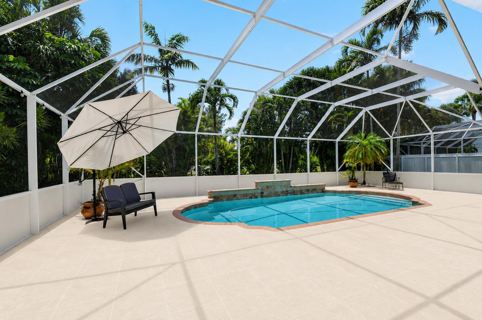 6283 Shadow Tree Lane Lake Worth, FL 33463 - Photo 48 of 84 Pool Deck 3