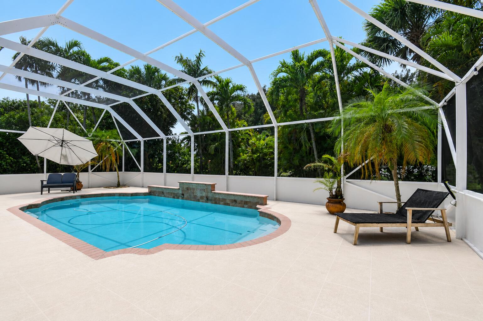 6283 Shadow Tree Lane Lake Worth, FL 33463 - Photo 49 of 84 Pool deck 2