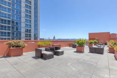 a view of a terrace with outdoor seating