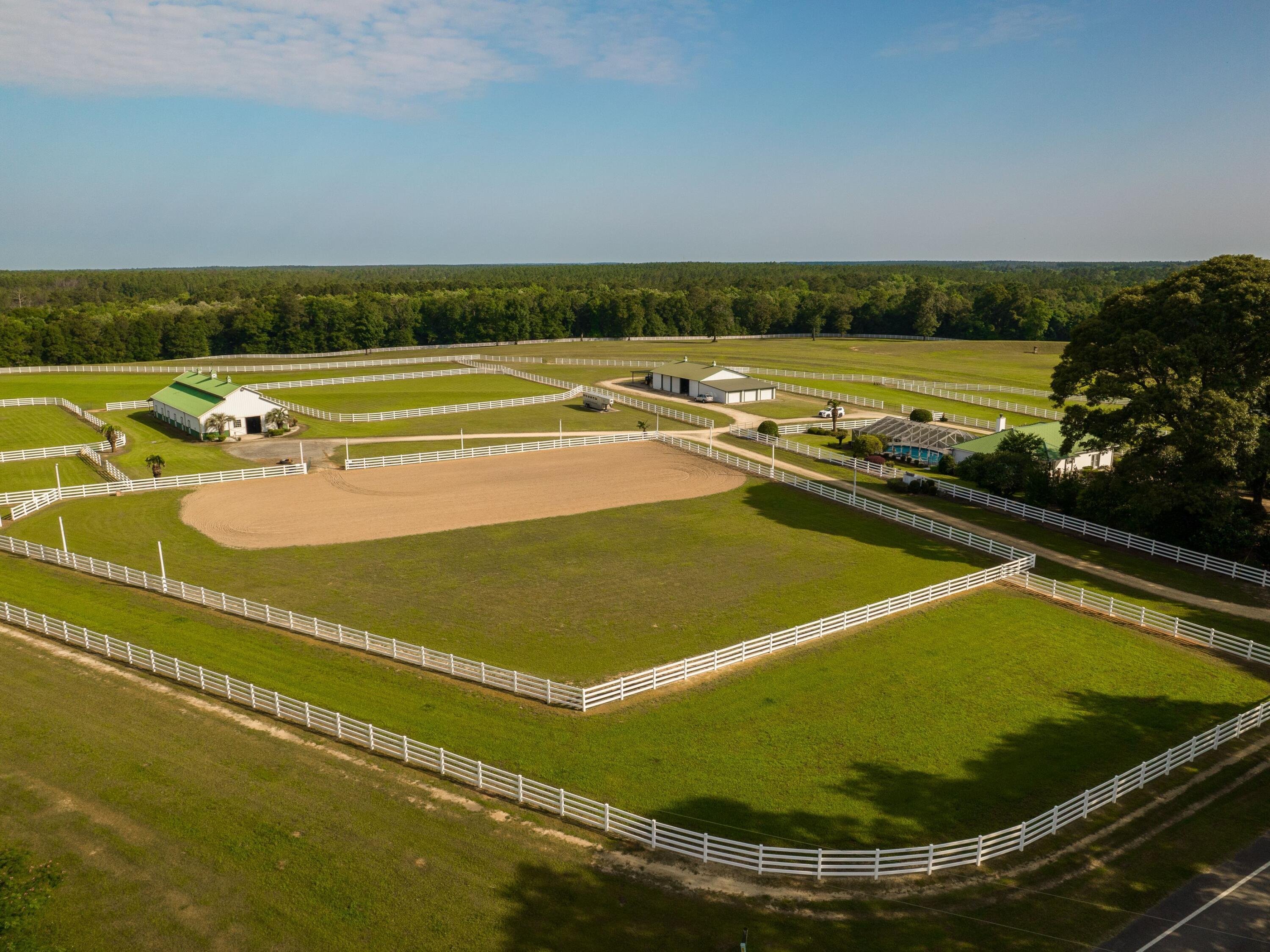 5676 Highway 2 DeFuniak Springs, FL 32433 - Photo 25 of 42 a view of a swimming pool and an outdoor seating