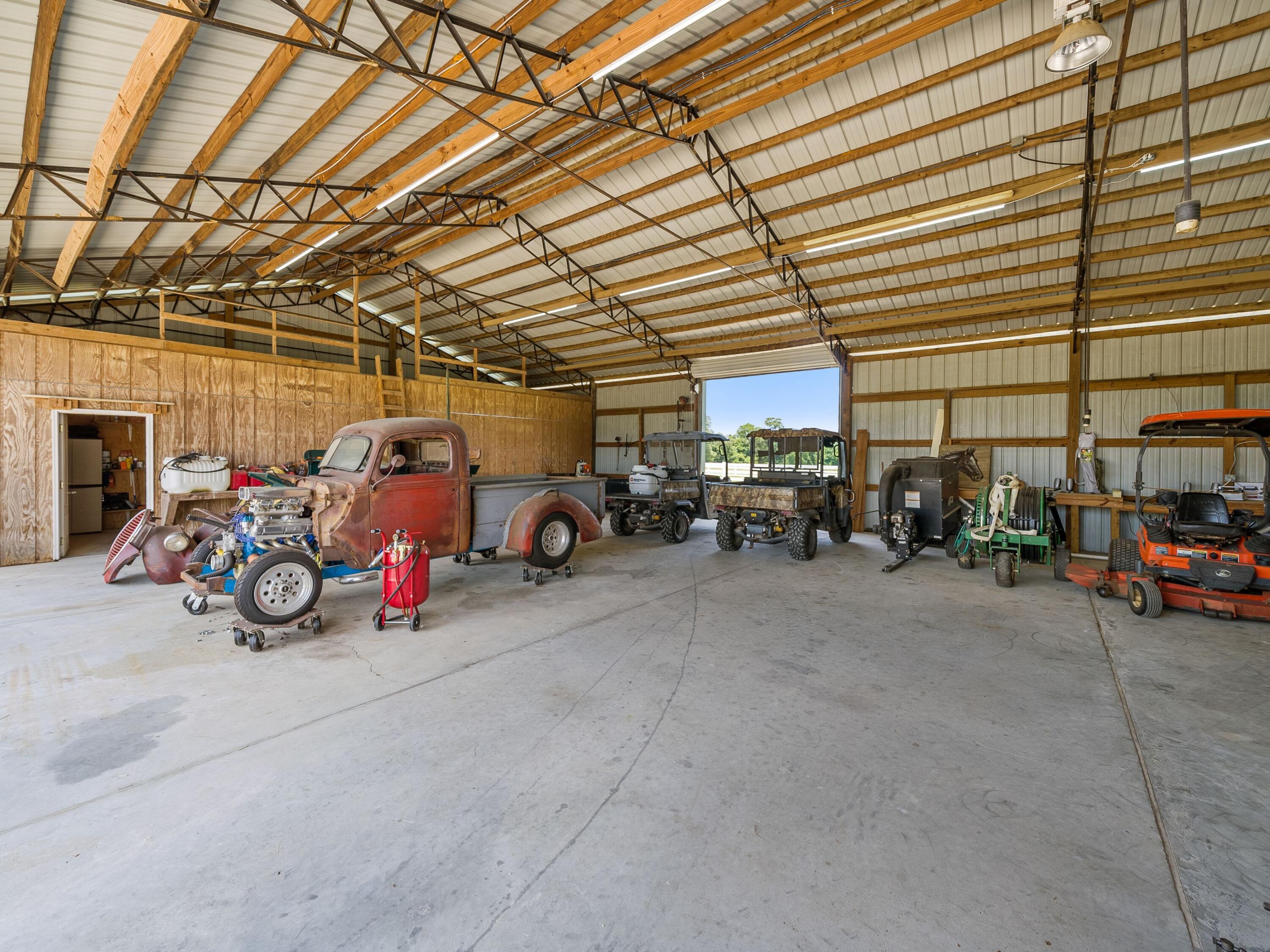 5676 Highway 2 DeFuniak Springs, FL 32433 - Photo 41 of 42 a view of a garage with parked cars