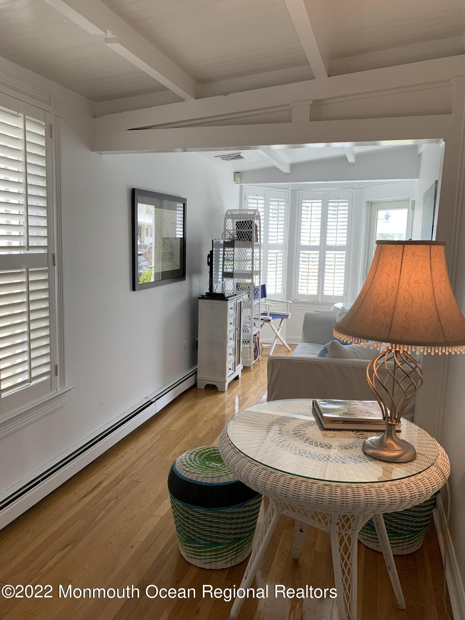 13 Heck Avenue Ocean Grove, NJ 07756 - Photo 21 of 25 a room with furniture and window