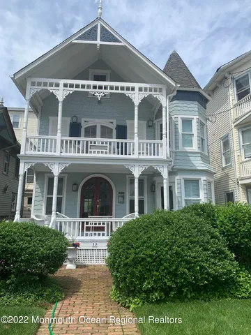 a front view of a house with a porch
