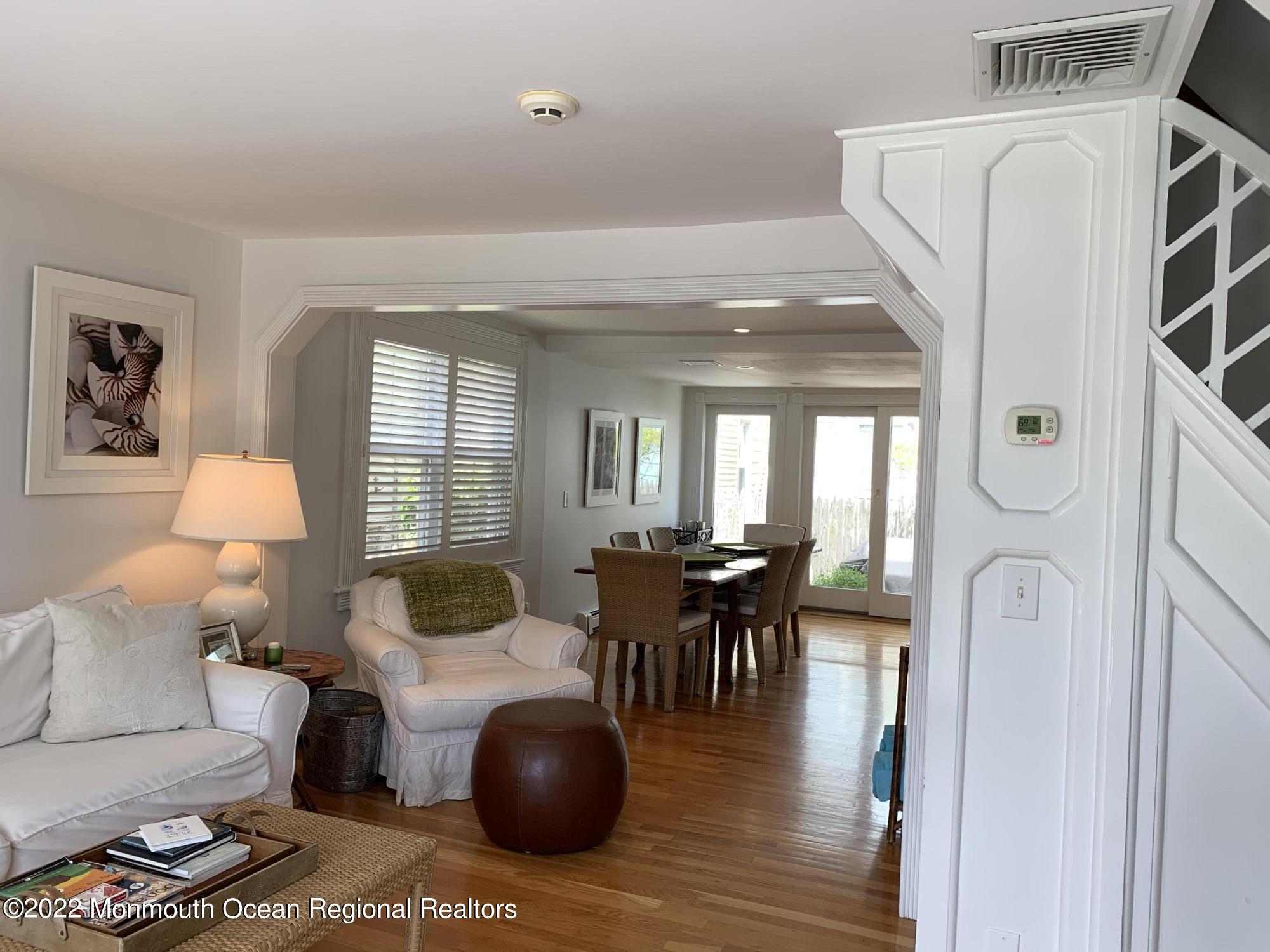 13 Heck Avenue Ocean Grove, NJ 07756 - Photo 5 of 25 a living room with furniture and a table