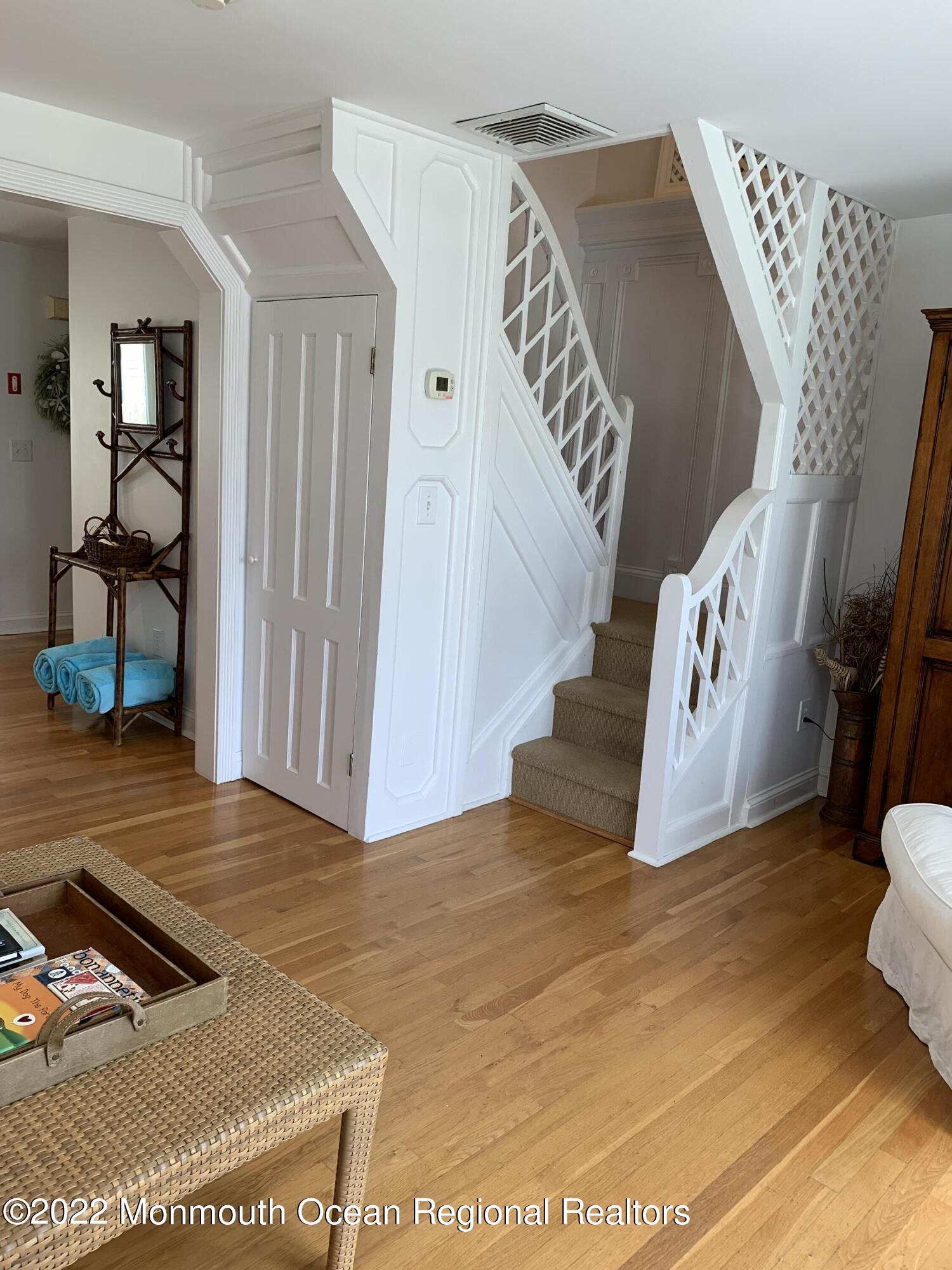 13 Heck Avenue Ocean Grove, NJ 07756 - Photo 6 of 25 a view of an entryway with wooden floor