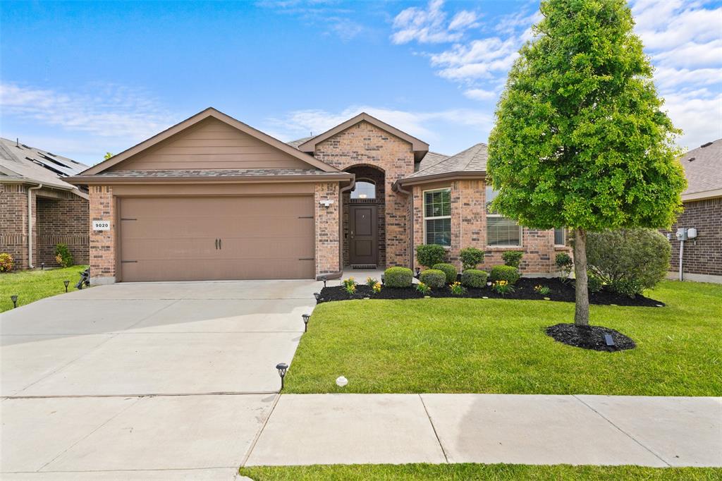 9020 Ridgeriver Way Fort Worth, TX 76131 - Photo 1 of 26 a front view of house with yard and green space