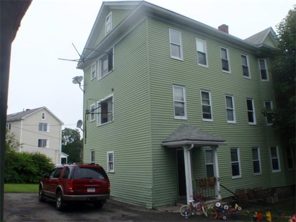 6 Malmo Street Worcester, MA 01607 - Photo 3 of 10 a car parked in front of a house
