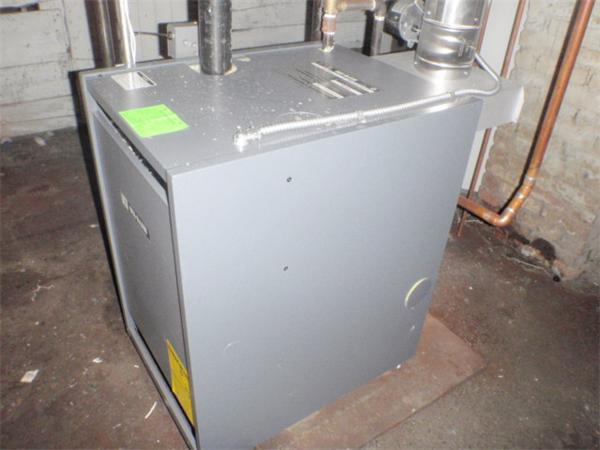 6 Malmo Street Worcester, MA 01607 - Photo 7 of 10 a bathroom with a granite countertop sink and a mirror