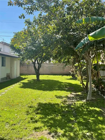 a view of a house with a big yard