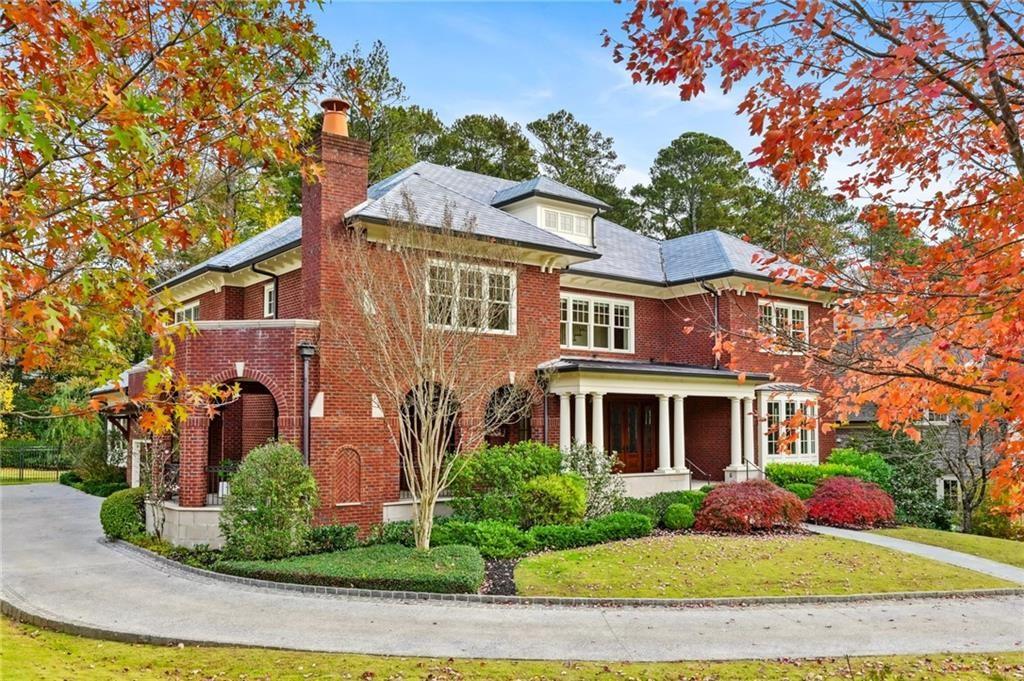 1753 Merton Road Northeast Atlanta, GA 30306 - Photo 1 of 1 a front view of a house with a yard