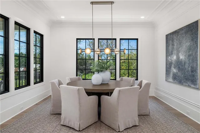 a bedroom with a bed couch and window