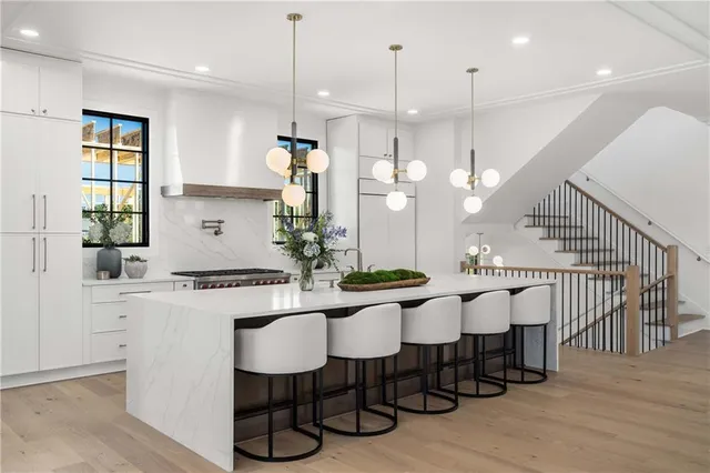 a view of entryway with stairs and wooden floor