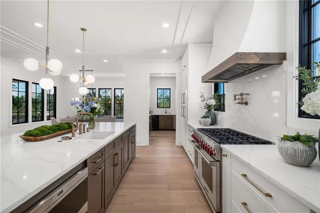 a bathroom with a double vanity sink and mirror