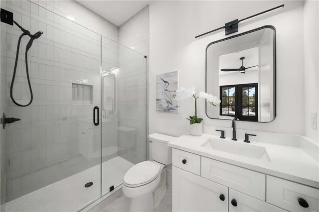 a balcony with wooden floor and outdoor seating