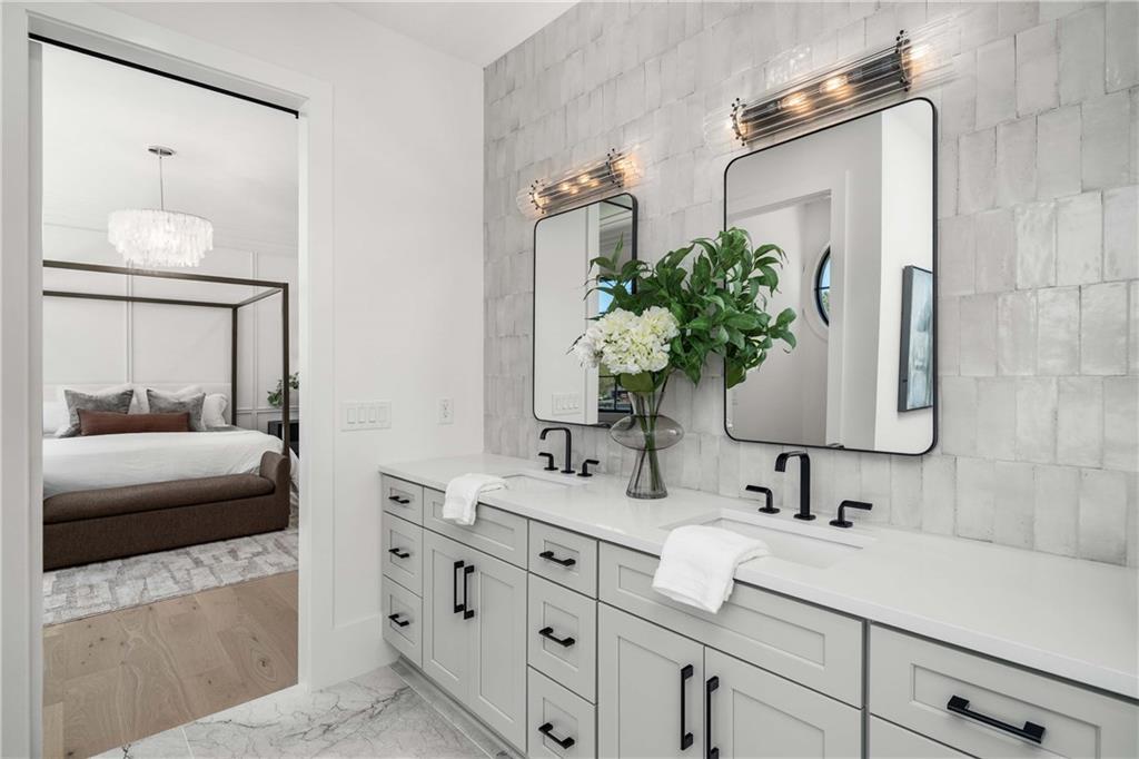 257 Lask Lane Milton, GA 30004 - Photo 31 of 84 a bathroom with a sink and a mirror