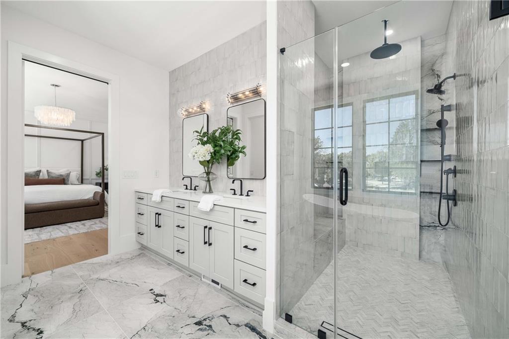 257 Lask Lane Milton, GA 30004 - Photo 33 of 84 a bathroom with a double vanity sink and mirror