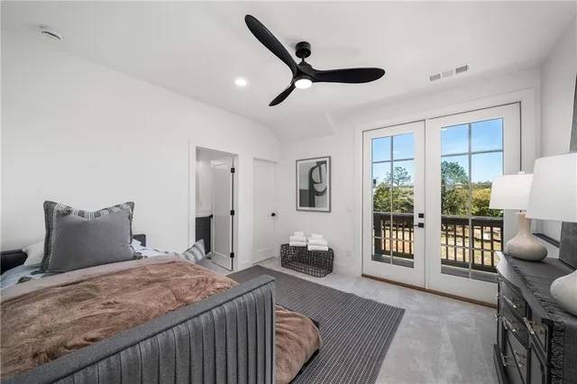 a picture of a room with a white wall and a large window