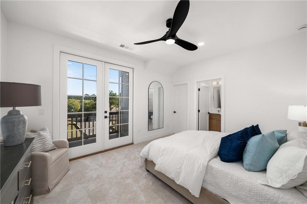 257 Lask Lane Milton, GA 30004 - Photo 38 of 84 a bedroom with a large bed and a window