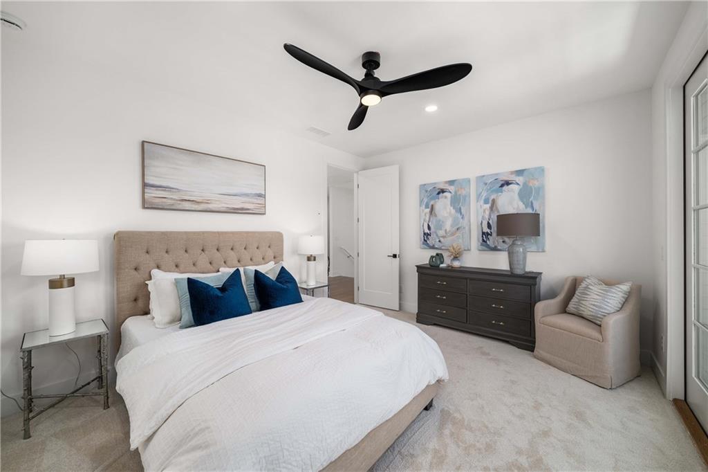 257 Lask Lane Milton, GA 30004 - Photo 39 of 84 a bedroom with a bed and furniture