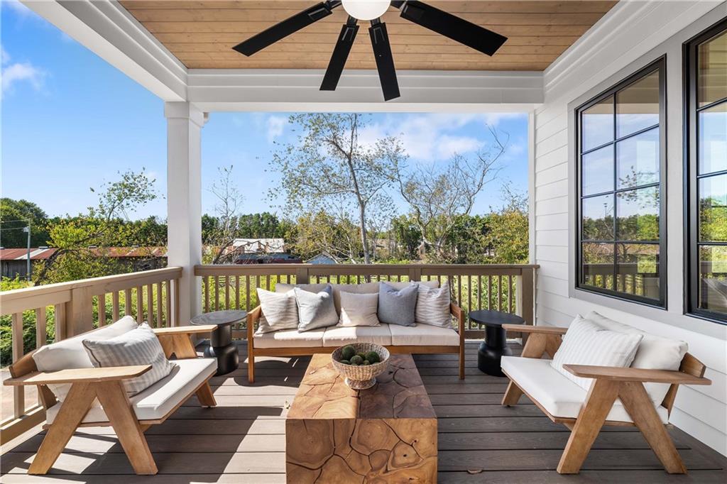 257 Lask Lane Milton, GA 30004 - Photo 41 of 84 a balcony with wooden floor and outdoor seating
