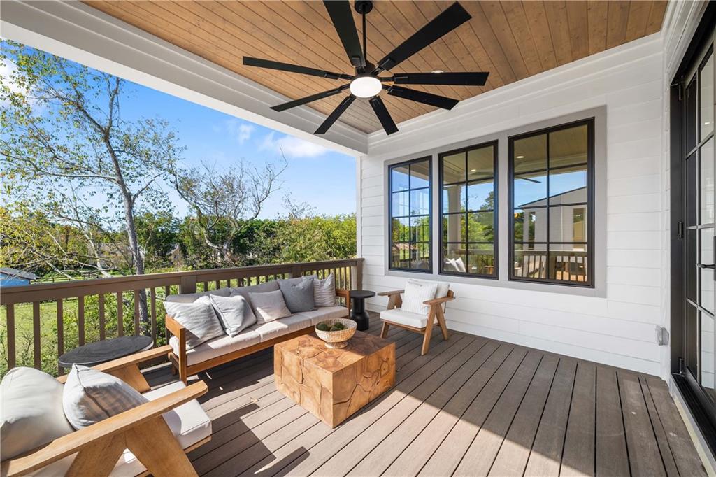 257 Lask Lane Milton, GA 30004 - Photo 42 of 84 a balcony with wooden floor and outdoor seating