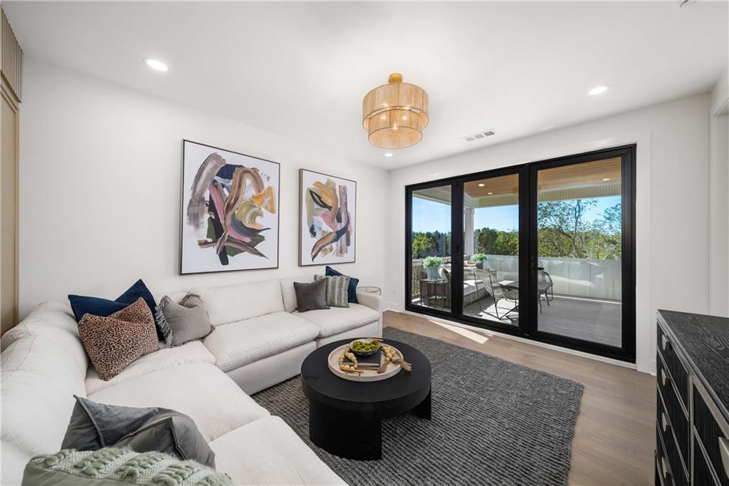 257 Lask Lane Milton, GA 30004 - Photo 47 of 84 a living room with furniture and a large window