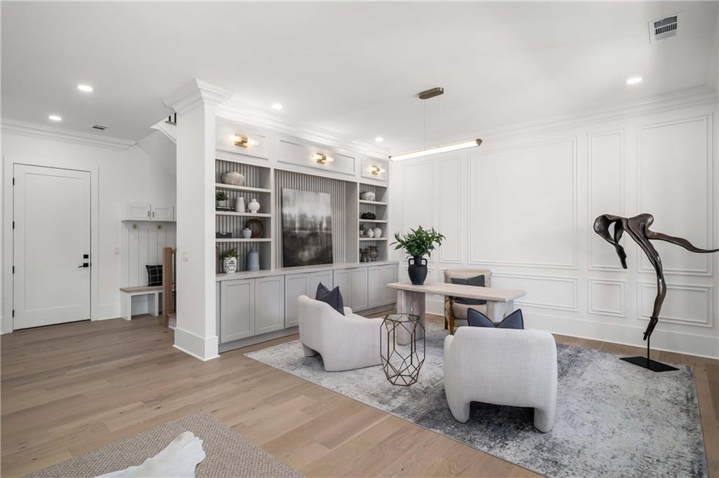 257 Lask Lane Milton, GA 30004 - Photo 7 of 84 a living room with furniture and a rug