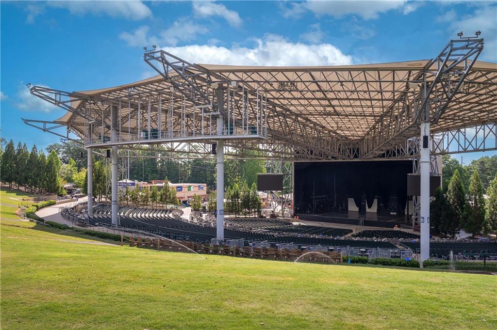 257 Lask Lane Milton, GA 30004 - Photo 83 of 84 a view of a swimming pool with an outdoor seating