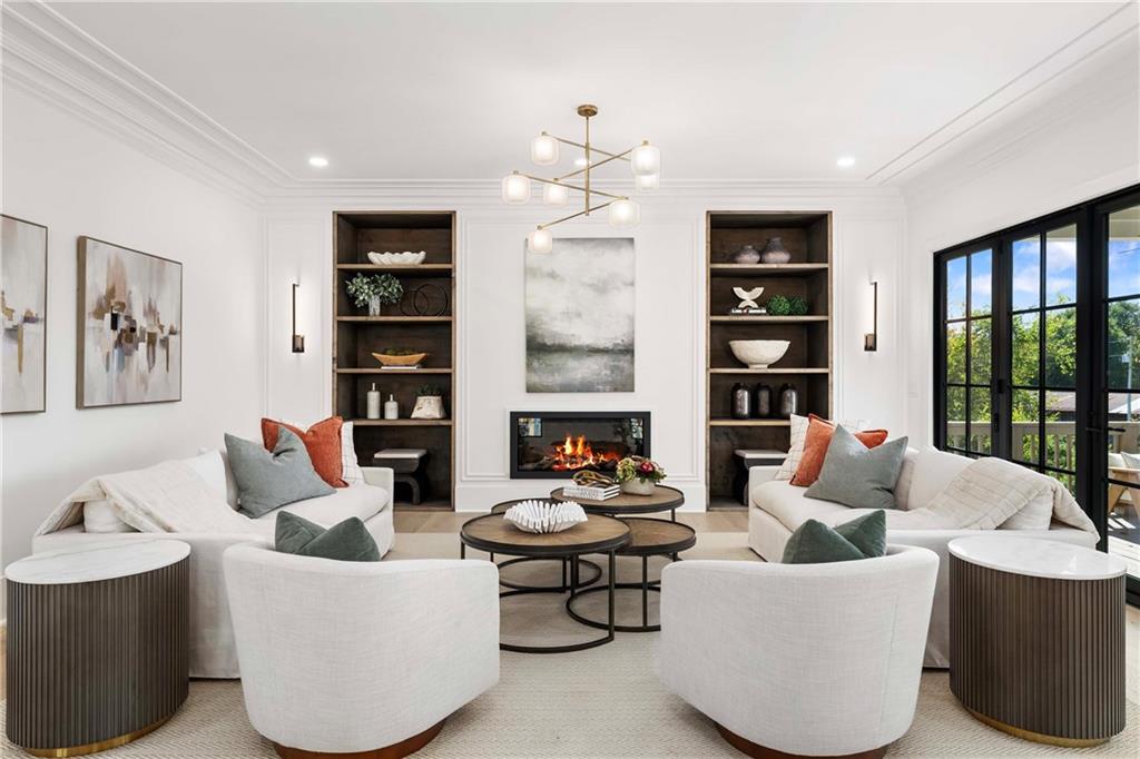 257 Lask Lane Milton, GA 30004 - Photo 9 of 84 a living room with furniture large window and cabinet